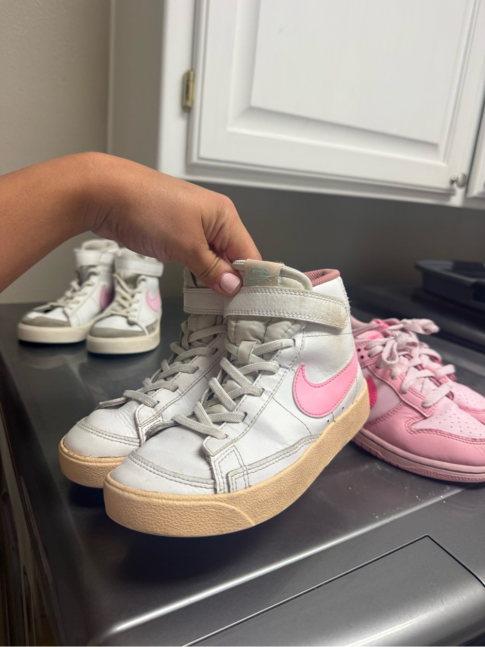 Nike Kids White High-Top Sneakers with Pink Swoosh and Gum Sole